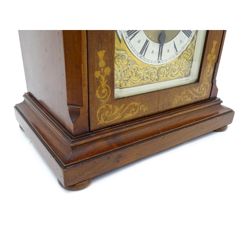 1493 - An early 20thC German 8 day mantel clock by Junghans, the case with inlaid detail. Approx. 16 3/4