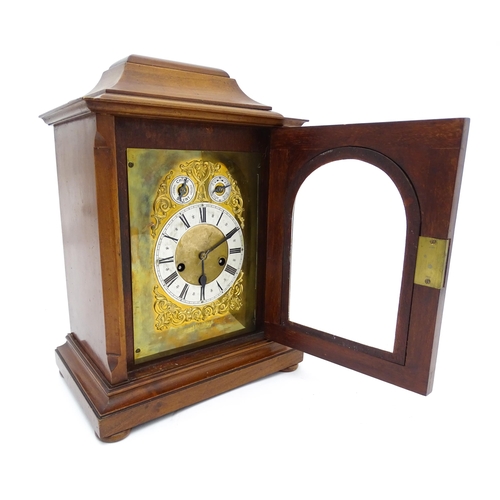 1493 - An early 20thC German 8 day mantel clock by Junghans, the case with inlaid detail. Approx. 16 3/4