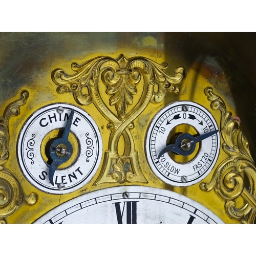 1493 - An early 20thC German 8 day mantel clock by Junghans, the case with inlaid detail. Approx. 16 3/4