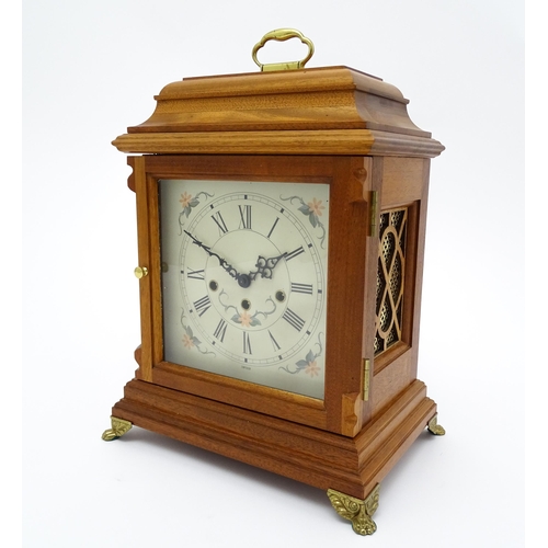 1495 - A 20thC German walnut cased 8 day bracket / mantel clock by Franz Hermle. Approx. 16 3/4