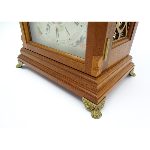 1495 - A 20thC German walnut cased 8 day bracket / mantel clock by Franz Hermle. Approx. 16 3/4