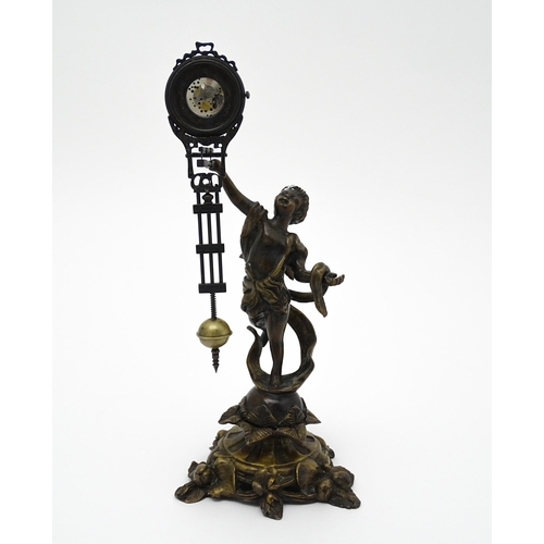 1497 - A 20thC mystery clock / swing clock base formed as a Classical boy. The whole approx. 12 1/2