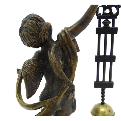 1497 - A 20thC mystery clock / swing clock base formed as a Classical boy. The whole approx. 12 1/2