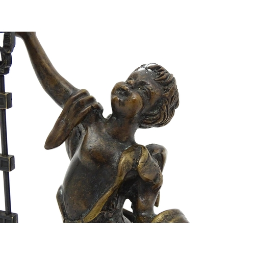 1497 - A 20thC mystery clock / swing clock base formed as a Classical boy. The whole approx. 12 1/2