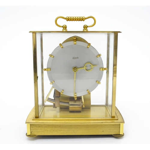 1500 - A 20thC retro German electromagnetic mantel clock by Kieninger & Obergfell, the dial signed Kundo. W... 