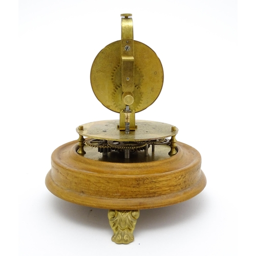 1501 - A 20thC Briggs Rotary flying ball pendulum style clock, mounted on a turned wooden base and having a... 