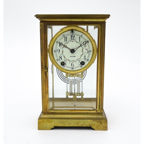 1503 - An American 20thC brass four glass mantle clock / regulator, the 8-day movement striking on a gong r... 