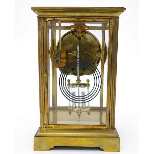 1503 - An American 20thC brass four glass mantle clock / regulator, the 8-day movement striking on a gong r... 