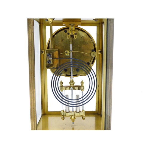 1503 - An American 20thC brass four glass mantle clock / regulator, the 8-day movement striking on a gong r... 