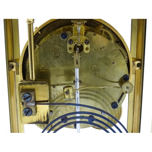 1503 - An American 20thC brass four glass mantle clock / regulator, the 8-day movement striking on a gong r... 