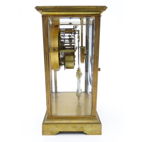 1503 - An American 20thC brass four glass mantle clock / regulator, the 8-day movement striking on a gong r... 