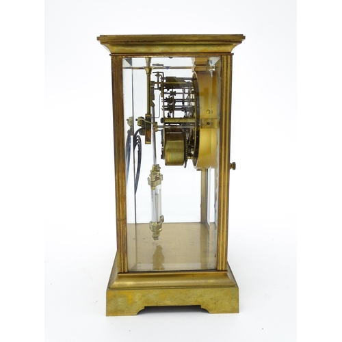 1503 - An American 20thC brass four glass mantle clock / regulator, the 8-day movement striking on a gong r... 