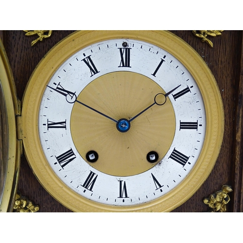 1504 - A German oak cased 8 day mantel clock, the movement marked Lenzkirch and striking on a gong. Approx.... 