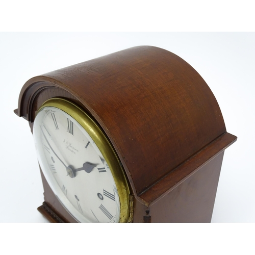 1506 - A mahogany cased mantel clock, the dial with Roman hour marks and signed J. W. Benson, London, the 8... 