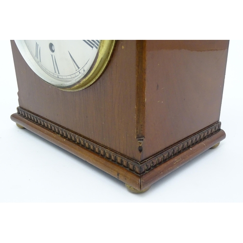 1506 - A mahogany cased mantel clock, the dial with Roman hour marks and signed J. W. Benson, London, the 8... 