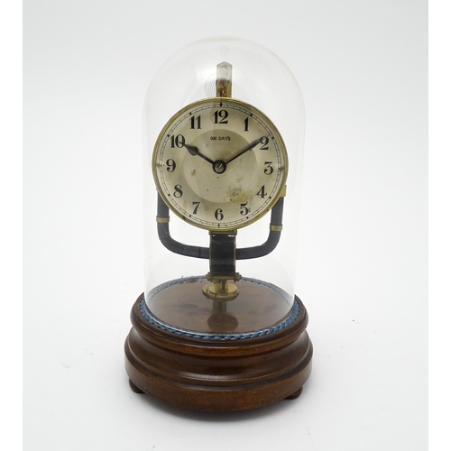 1507 - A Bulle type electric torsion 800 day mantel clock under dome. Approx. 10 1/2