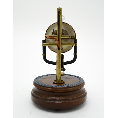 1507 - A Bulle type electric torsion 800 day mantel clock under dome. Approx. 10 1/2