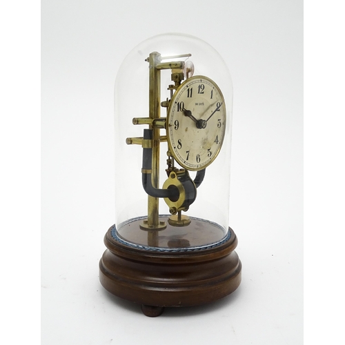 1507 - A Bulle type electric torsion 800 day mantel clock under dome. Approx. 10 1/2