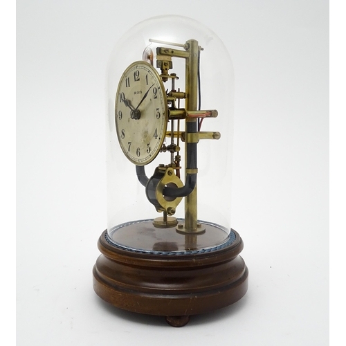 1507 - A Bulle type electric torsion 800 day mantel clock under dome. Approx. 10 1/2