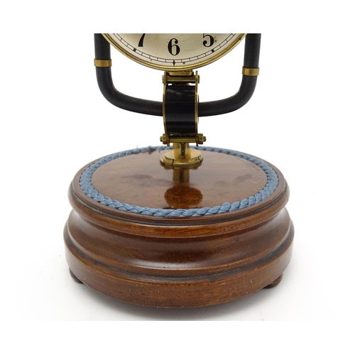 1507 - A Bulle type electric torsion 800 day mantel clock under dome. Approx. 10 1/2