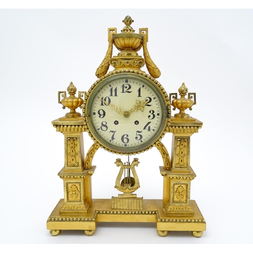 1508 - An early 20thC German gilt brass 8 day mantel clock by Lenzkircher, the dial with Arabic numerals, t... 