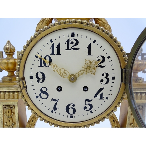 1508 - An early 20thC German gilt brass 8 day mantel clock by Lenzkircher, the dial with Arabic numerals, t... 