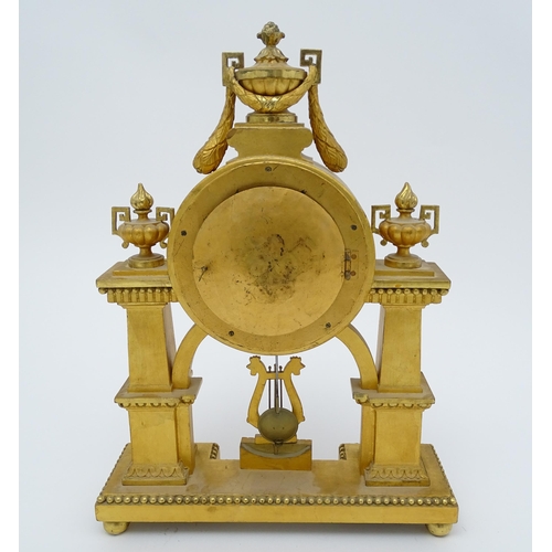 1508 - An early 20thC German gilt brass 8 day mantel clock by Lenzkircher, the dial with Arabic numerals, t... 