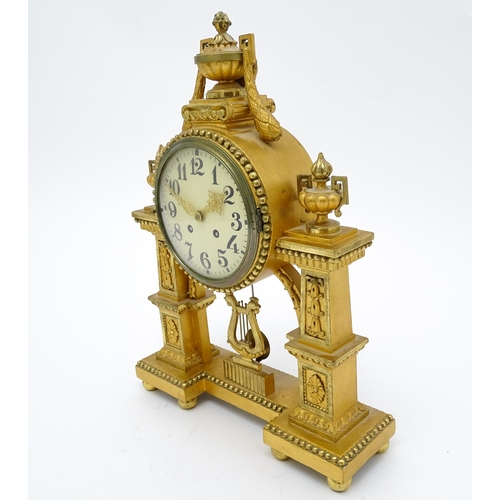 1508 - An early 20thC German gilt brass 8 day mantel clock by Lenzkircher, the dial with Arabic numerals, t... 