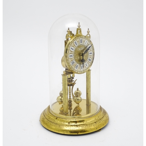 1510 - A late 20thC anniversary / torsion clock by Haller. Approx. 11 3/4