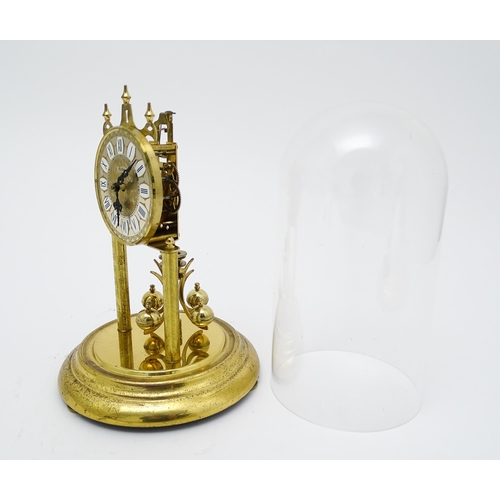 1510 - A late 20thC anniversary / torsion clock by Haller. Approx. 11 3/4