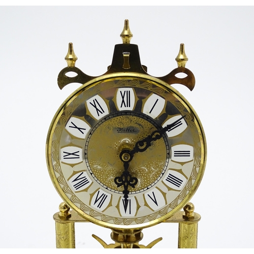 1510 - A late 20thC anniversary / torsion clock by Haller. Approx. 11 3/4