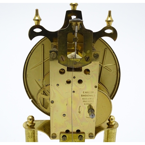 1510 - A late 20thC anniversary / torsion clock by Haller. Approx. 11 3/4