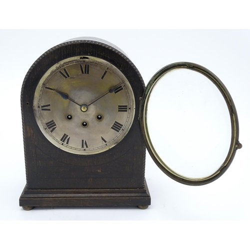 1511 - An oak cased 8 day chiming mantel clock by Gustav Becker. Approx. 14 1/2