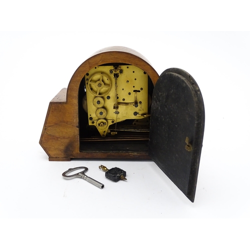 1512 - A German Art Deco walnut cased 8 day mantel clock with Westminster Chimes, by Haller. Approx. 8