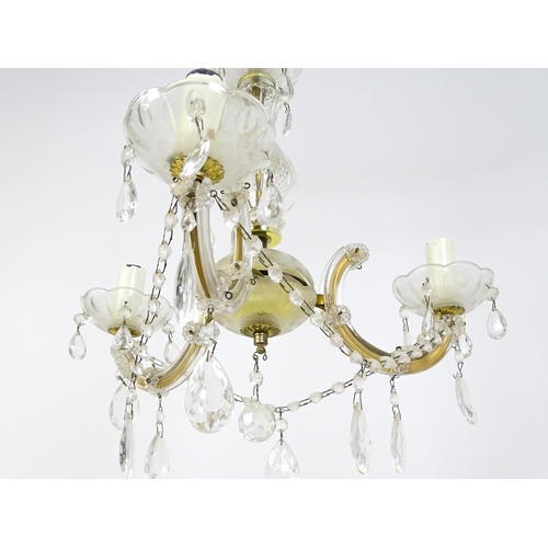 1524 - A late 20thC three branch chandelier / electrolier with lustre detail. Approx. 22