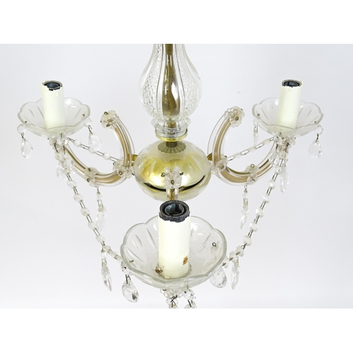 1524 - A late 20thC three branch chandelier / electrolier with lustre detail. Approx. 22