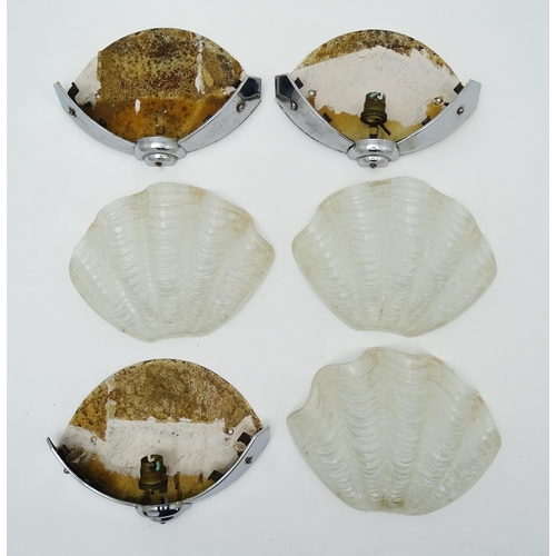 1534 - Three retro chrome and frosted glass wall lights of shell form. Approx. 8