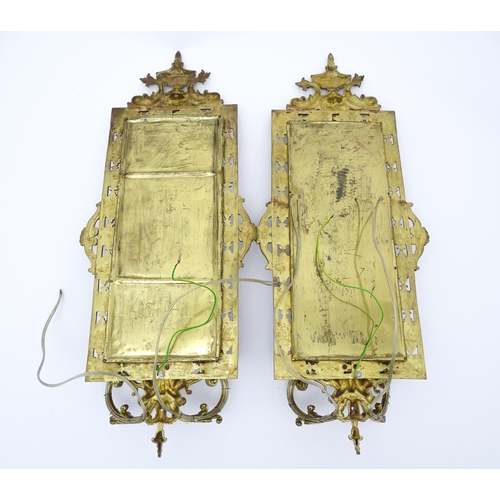 1549 - A pair of 20thC brass girandoles / electroliers surmounted by Neoclassical urns flanked by Georgian ... 