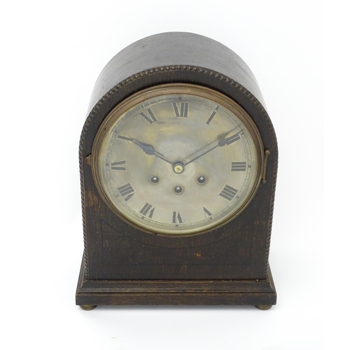 1511 - An oak cased 8 day chiming mantel clock by Gustav Becker. Approx. 14 1/2