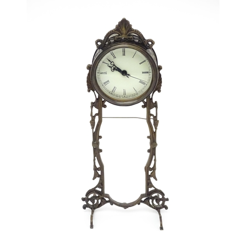 1513 - An American Waterbury Clock Co. mantel clock with cherub. Approx. 13 3/4