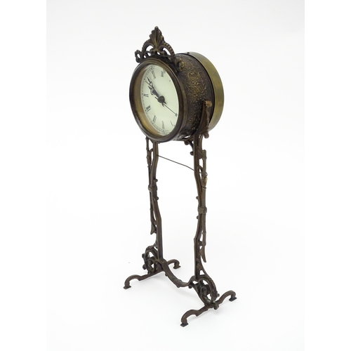 1513 - An American Waterbury Clock Co. mantel clock with cherub. Approx. 13 3/4