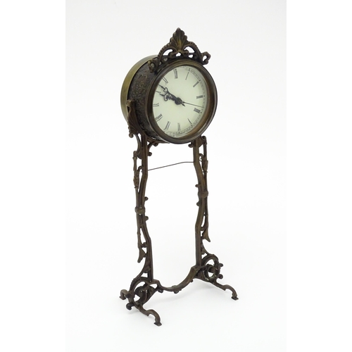 1513 - An American Waterbury Clock Co. mantel clock with cherub. Approx. 13 3/4