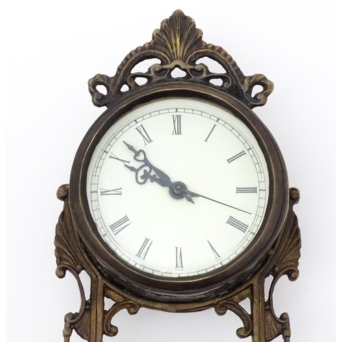 1513 - An American Waterbury Clock Co. mantel clock with cherub. Approx. 13 3/4