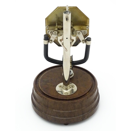 1517 - A Bulle type electric clock on Bakelite style base. Together with a mid century Bulle electric clock... 