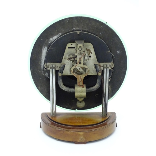 1517 - A Bulle type electric clock on Bakelite style base. Together with a mid century Bulle electric clock... 