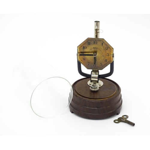 1517 - A Bulle type electric clock on Bakelite style base. Together with a mid century Bulle electric clock... 