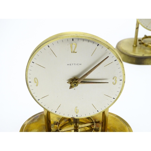 1518 - Two Hettich electric clocks under domes. Approx. 8 3/4