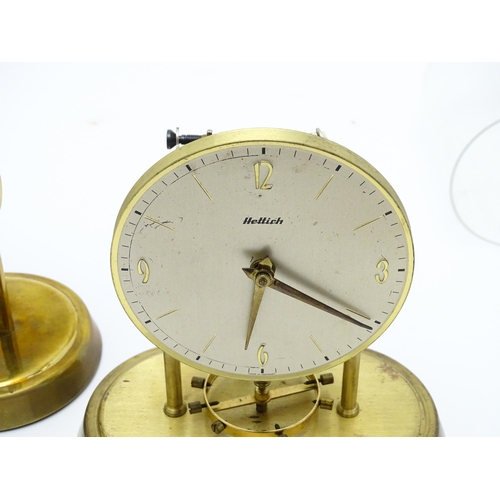 1518 - Two Hettich electric clocks under domes. Approx. 8 3/4