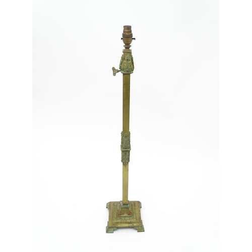 1554 - A large 20thC table lamp of squared column form on stepped base with acanthus detail. Approx. 23