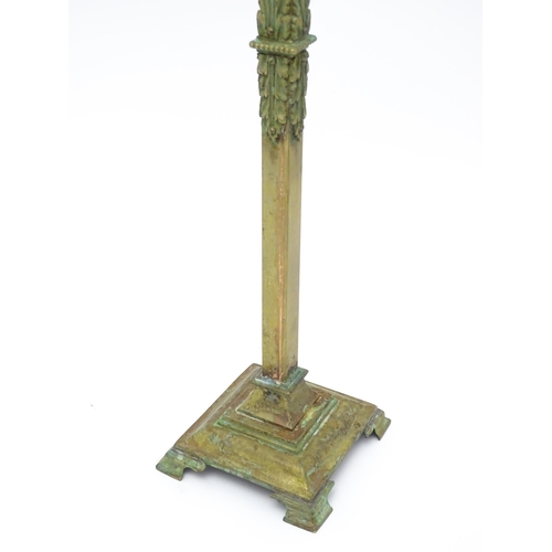 1554 - A large 20thC table lamp of squared column form on stepped base with acanthus detail. Approx. 23